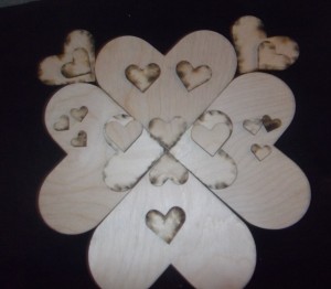 Heart Mandala face made from wooden hearts